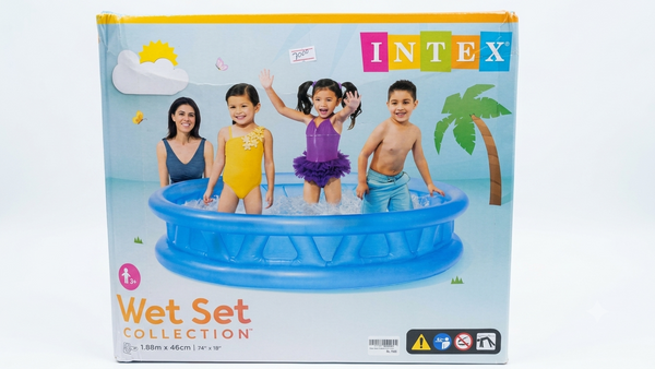Child playing in Intex Wet Set inflatable pool in garden